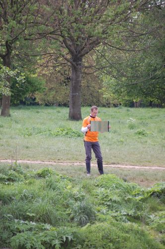 photo showing a moment from the piece “Schwalbe”, which was performed on and by a small river