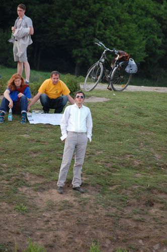 photo showing a moment from the piece “Schwalbe”, which was performed on and by a small river