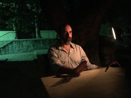 picture showing a moment from Manos Tsangaris' piece “Love & Diversity” in Chios