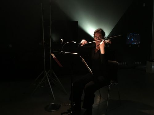picture showing a moment from Manos Tsangaris' side specific theatre “LIVING SPACES” in Aarhus 2017